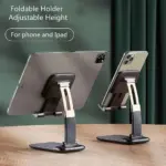 Foldable universal mobile stand holding a smartphone on a desk. - Obeepo.in